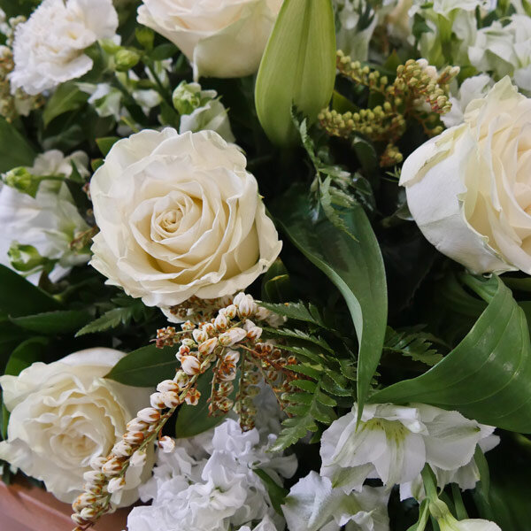 white casket spray sympathy flowers